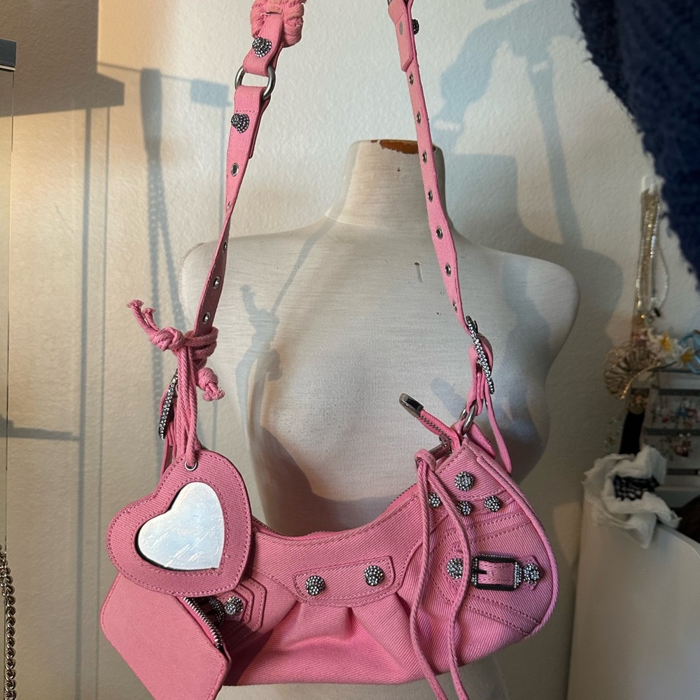 Pink denim bag with charms